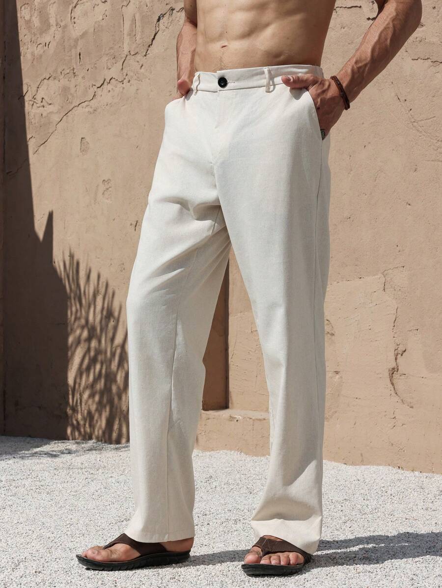 PANTALONI IN LINO CON TASCHE