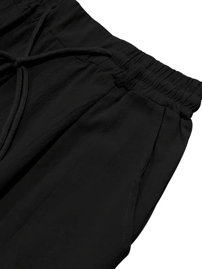 PANTALONI LARGHI IN LINO CON COULISSE