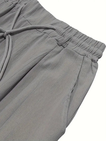 NICHOLS | PANTALONI LARGHI IN LINO CON COULISSE