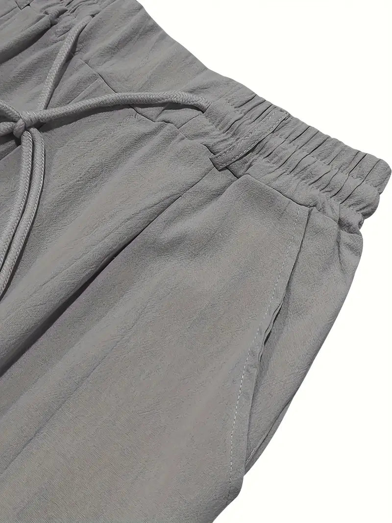 PANTALONI LARGHI IN LINO CON COULISSE