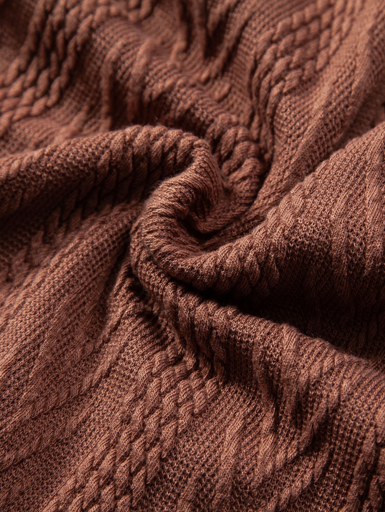 POLO IN JACQUARD GEOMETRICO LAVORATO A MAGLIA