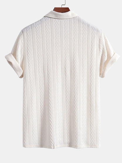 POLO IN JACQUARD GEOMETRICO LAVORATO A MAGLIA