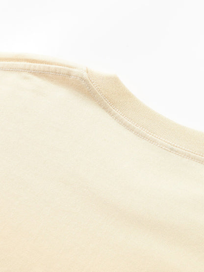 T-SHIRT A MANICHE LUNGHE PESANTE CON ORLO CURVO