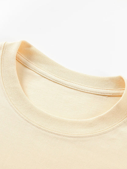 T-SHIRT A MANICHE LUNGHE PESANTE CON ORLO CURVO
